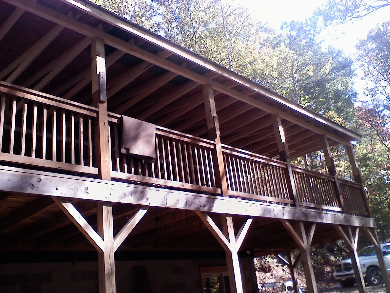 Timber framing under a new elevated porch and deck — Roof Leak Repair in Binghamton by Roofing Brothers